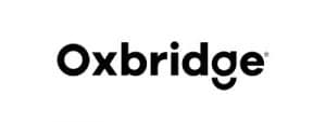 The image displays the word Oxbridge in bold, black, sans-serif font on a white background. The tail of the letter g curves upward to form a smile shape, subtly integrating ICB into the modern and inviting design.